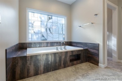 Back on the Market - Now at a SMOKING DEAL!! Experience luxury on The Club At Old Kinderhook in Missouri - for sale on GolfHomes.com, golf home, golf lot