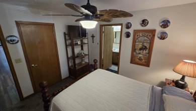 Discover your dream home in the heart of Fairfield Bay's resort on Mountain Ranch Golf Club in Arkansas - for sale on GolfHomes.com, golf home, golf lot