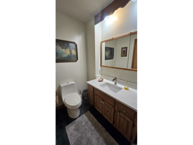 Discover your dream home in the heart of Fairfield Bay's resort on Mountain Ranch Golf Club in Arkansas - for sale on GolfHomes.com, golf home, golf lot