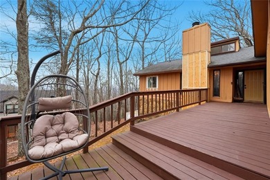 A storybook mountain bungalow offering the gentle ambiance of on Bent Tree Golf Course in Georgia - for sale on GolfHomes.com, golf home, golf lot