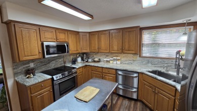 Discover your dream home in the heart of Fairfield Bay's resort on Mountain Ranch Golf Club in Arkansas - for sale on GolfHomes.com, golf home, golf lot