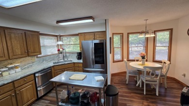 Discover your dream home in the heart of Fairfield Bay's resort on Mountain Ranch Golf Club in Arkansas - for sale on GolfHomes.com, golf home, golf lot