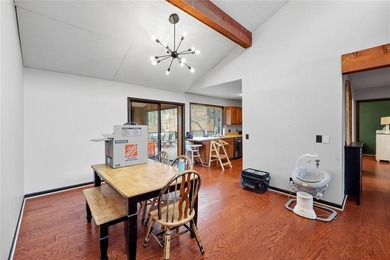 A storybook mountain bungalow offering the gentle ambiance of on Bent Tree Golf Course in Georgia - for sale on GolfHomes.com, golf home, golf lot