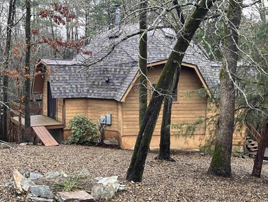 Rare DELCO-inspired octagon home offering striking architecture on Ponce De Leon Golf Course in Arkansas - for sale on GolfHomes.com, golf home, golf lot