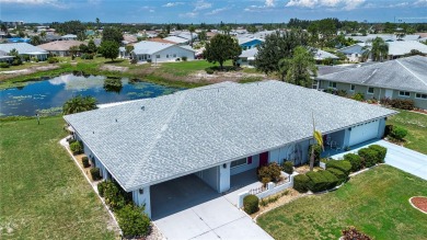 One or more photo(s) has been virtually staged. A lovely pond on Sandpiper Golf Club in Florida - for sale on GolfHomes.com, golf home, golf lot