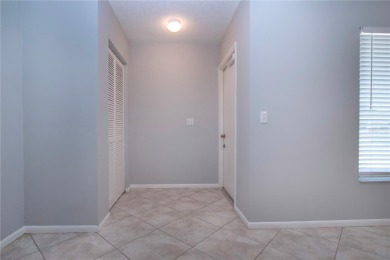 One or more photo(s) has been virtually staged. A lovely pond on Sandpiper Golf Club in Florida - for sale on GolfHomes.com, golf home, golf lot
