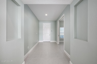 Seller offering $5,000 credit to buyer for closing costs or to on LPGA International Golf Course in Florida - for sale on GolfHomes.com, golf home, golf lot