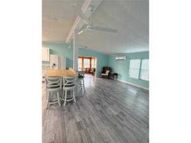 Escape to your own slice of paradise in this charming Beverly on Grand Haven Golf Club in Florida - for sale on GolfHomes.com, golf home, golf lot