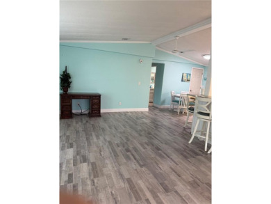 Escape to your own slice of paradise in this charming Beverly on Grand Haven Golf Club in Florida - for sale on GolfHomes.com, golf home, golf lot