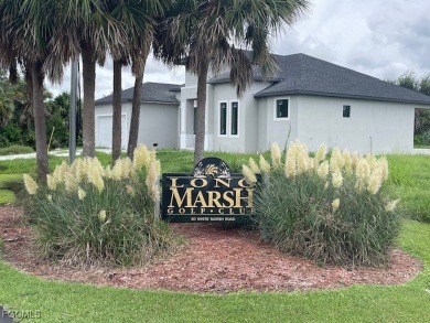 Nestled between the Gulf Coast of Florida and Charlotte Harbor on Rotonda Golf and Country Club - Long Marsh  in Florida - for sale on GolfHomes.com, golf home, golf lot
