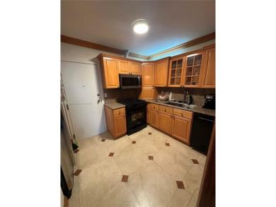 This beautifully classic 2-bedroom, 2-bathroom penthouse at the on Granada Golf Club in Florida - for sale on GolfHomes.com, golf home, golf lot