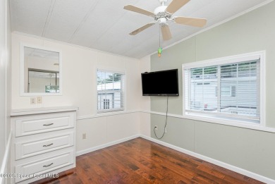 This charming park model home in The Great Outdoors RV  Golf on The Great Outdoors Golf and Country Club in Florida - for sale on GolfHomes.com, golf home, golf lot