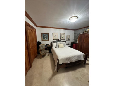 This beautifully classic 2-bedroom, 2-bathroom penthouse at the on Granada Golf Club in Florida - for sale on GolfHomes.com, golf home, golf lot