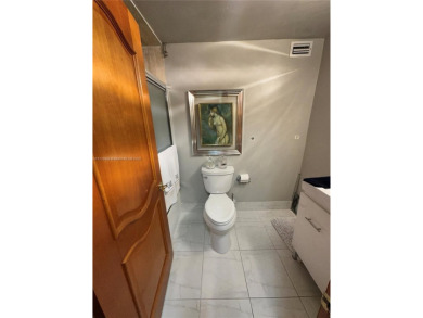 This beautifully classic 2-bedroom, 2-bathroom penthouse at the on Granada Golf Club in Florida - for sale on GolfHomes.com, golf home, golf lot