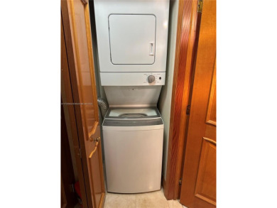 This beautifully classic 2-bedroom, 2-bathroom penthouse at the on Granada Golf Club in Florida - for sale on GolfHomes.com, golf home, golf lot