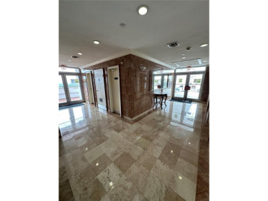 This beautifully classic 2-bedroom, 2-bathroom penthouse at the on Granada Golf Club in Florida - for sale on GolfHomes.com, golf home, golf lot
