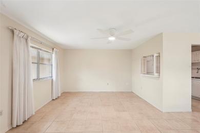 One or more photo(s) has been virtually staged. Location on Kings Point Executive Golf Course in Florida - for sale on GolfHomes.com, golf home, golf lot