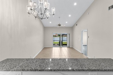 Beautifully Renovated Villa with Panoramic Lake ViewsEnjoy on Westchester Golf and Country Club in Florida - for sale on GolfHomes.com, golf home, golf lot