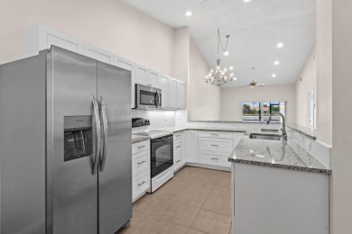 Beautifully Renovated Villa with Panoramic Lake ViewsEnjoy on Westchester Golf and Country Club in Florida - for sale on GolfHomes.com, golf home, golf lot