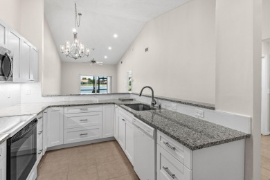 Beautifully Renovated Villa with Panoramic Lake ViewsEnjoy on Westchester Golf and Country Club in Florida - for sale on GolfHomes.com, golf home, golf lot
