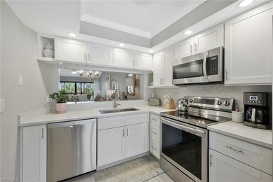 Enjoy elevated living in this beautifully updated two-bedroom on Royal Palm Golf Club in Florida - for sale on GolfHomes.com, golf home, golf lot