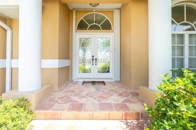Spacious WATERFRONT home on an oversized lot in desirable deed on Saint Andrews South Golf Club in Florida - for sale on GolfHomes.com, golf home, golf lot