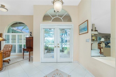Spacious WATERFRONT home on an oversized lot in desirable deed on Saint Andrews South Golf Club in Florida - for sale on GolfHomes.com, golf home, golf lot