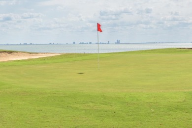 Enjoy amazing sunsets over the palm trees while sitting on you on South Padre Island Golf Club in Texas - for sale on GolfHomes.com, golf home, golf lot