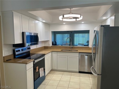 Desirable first floor end unit condo with 2 bedrooms and 2 on Seven Lakes Golf and Tennis Community in Florida - for sale on GolfHomes.com, golf home, golf lot