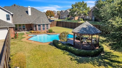 Immaculate home on over one third of an acre in N.Plano with on Ridgeview Ranch Golf Club in Texas - for sale on GolfHomes.com, golf home, golf lot