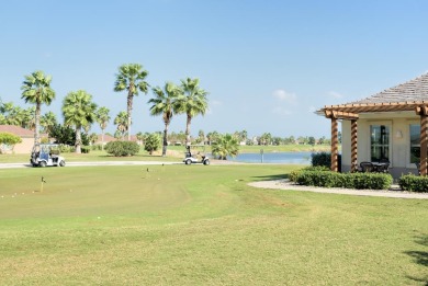 Enjoy amazing sunsets over the palm trees while sitting on you on South Padre Island Golf Club in Texas - for sale on GolfHomes.com, golf home, golf lot