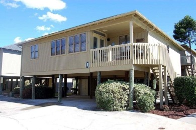 Welcome to your favorite vacation property or 2nd home.  Guest on The Dunes Golf and Beach Club in South Carolina - for sale on GolfHomes.com, golf home, golf lot