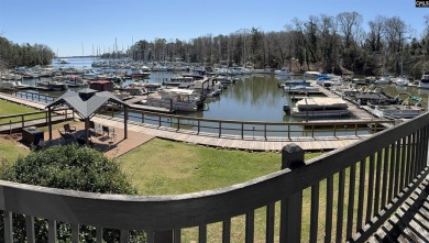 Come home and relax overlooking the water and boats in the cove on Club At Rawls Creek in South Carolina - for sale on GolfHomes.com, golf home, golf lot