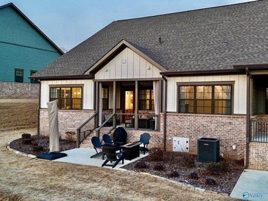 Step into this professionally decorated 3-bedroom, 2-bath home on Gunters Landing in Alabama - for sale on GolfHomes.com, golf home, golf lot