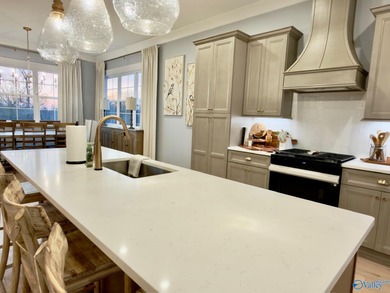 Step into this professionally decorated 3-bedroom, 2-bath home on Gunters Landing in Alabama - for sale on GolfHomes.com, golf home, golf lot