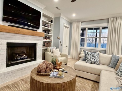 Step into this professionally decorated 3-bedroom, 2-bath home on Gunters Landing in Alabama - for sale on GolfHomes.com, golf home, golf lot