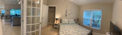 This spacious home is located between two golf courses and two on The Grand Club Cypress Course in Florida - for sale on GolfHomes.com, golf home, golf lot