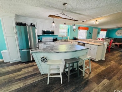 JUST LISTED! BEAUTIFUL 4 BED/3 BATH DBL WIDE BEACH HOUSE ON on Prestwick Country Club in South Carolina - for sale on GolfHomes.com, golf home, golf lot