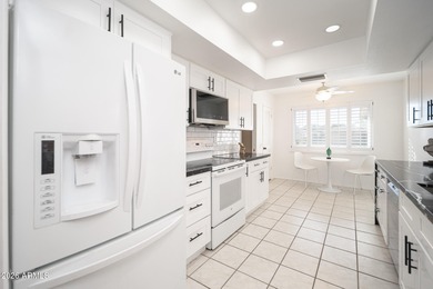 PREMIUM LEADED GLASS DOUBLE ENTRY DOORS OPEN TO THE SOARING on Sun City Lakes West and East in Arizona - for sale on GolfHomes.com, golf home, golf lot