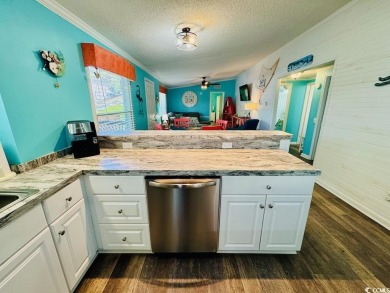 JUST LISTED! BEAUTIFUL 4 BED/3 BATH DBL WIDE BEACH HOUSE ON on Prestwick Country Club in South Carolina - for sale on GolfHomes.com, golf home, golf lot