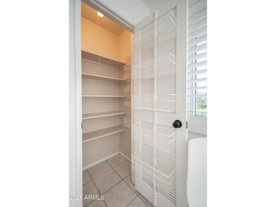 PREMIUM LEADED GLASS DOUBLE ENTRY DOORS OPEN TO THE SOARING on Sun City Lakes West and East in Arizona - for sale on GolfHomes.com, golf home, golf lot