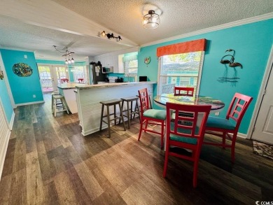 JUST LISTED! BEAUTIFUL 4 BED/3 BATH DBL WIDE BEACH HOUSE ON on Prestwick Country Club in South Carolina - for sale on GolfHomes.com, golf home, golf lot