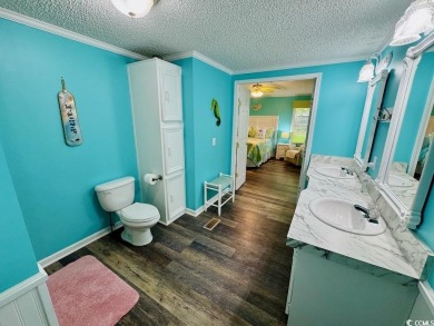JUST LISTED! BEAUTIFUL 4 BED/3 BATH DBL WIDE BEACH HOUSE ON on Prestwick Country Club in South Carolina - for sale on GolfHomes.com, golf home, golf lot