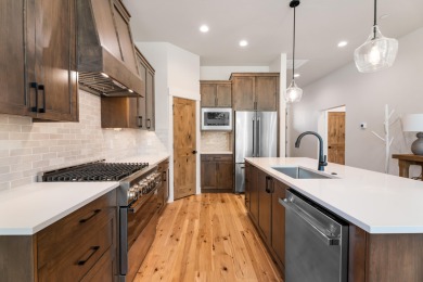Stunning two level Aspen plan with water views. Time limited on Sunriver Caldera Springs Golf Course in Oregon - for sale on GolfHomes.com, golf home, golf lot