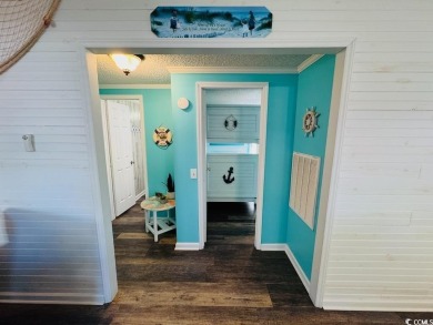 JUST LISTED! BEAUTIFUL 4 BED/3 BATH DBL WIDE BEACH HOUSE ON on Prestwick Country Club in South Carolina - for sale on GolfHomes.com, golf home, golf lot