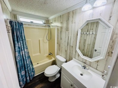 JUST LISTED! BEAUTIFUL 4 BED/3 BATH DBL WIDE BEACH HOUSE ON on Prestwick Country Club in South Carolina - for sale on GolfHomes.com, golf home, golf lot