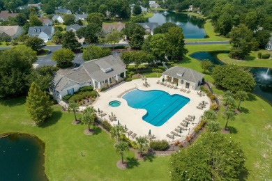 Lush landscaping surrounds this 4-bedroom (One bedroom is on The Founders Club At Pawleys Island in South Carolina - for sale on GolfHomes.com, golf home, golf lot