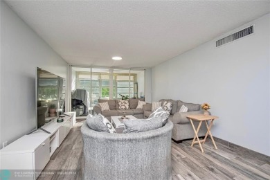 Welcome to resort style living in this completely renovated on Pine Island Ridge Country Club in Florida - for sale on GolfHomes.com, golf home, golf lot
