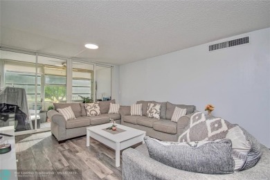 Welcome to resort style living in this completely renovated on Pine Island Ridge Country Club in Florida - for sale on GolfHomes.com, golf home, golf lot