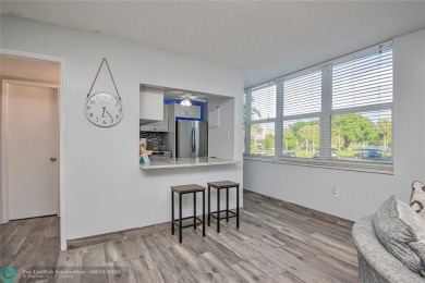 Welcome to resort style living in this completely renovated on Pine Island Ridge Country Club in Florida - for sale on GolfHomes.com, golf home, golf lot
